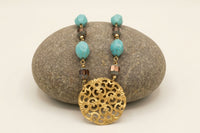 Collier ras du cou avec gros pendentif