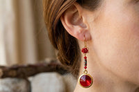 Red coral earrings.