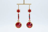 Red coral earrings.