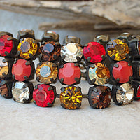 Multi colors Rebeka earrings. Red orange earrings. Antique brass fire earrings. Pave earrings. Rebeka Crystal fancy bar stone earrings