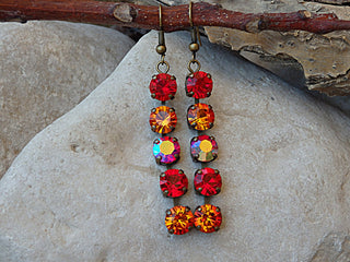 Multi colors Rebeka earrings. Red orange earrings. Antique brass fire earrings. Pave earrings. Rebeka Crystal fancy bar stone earrings