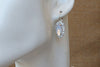 Milky White Bridal Earrings. White Opal Rebeka Earrings. Bridal Oval Earrings. Bridal Crystal Drop Earrings. Silver Rhinestone Earrings