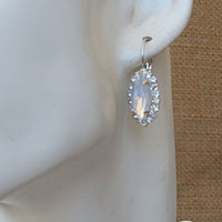 Milky White Bridal Earrings. White Opal Rebeka Earrings. Bridal Oval Earrings. Bridal Crystal Drop Earrings. Silver Rhinestone Earrings