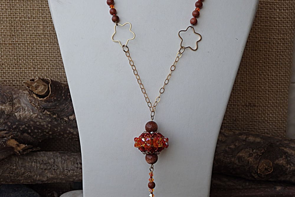 Orange Tassel Necklace. Rebeka Beaded Necklace. Fire Colors Y Necklace. Gold Filled Star Necklace. Orange And Brown Sand Bead Necklace