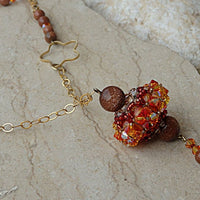Orange Tassel Necklace. Rebeka Beaded Necklace. Fire Colors Y Necklace. Gold Filled Star Necklace. Orange And Brown Sand Bead Necklace