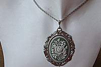 Vintage Style Necklace. Oval Silver Pendant With White Flowers Pendant. Vintage Style Pendant. Ceramic Pendant Necklace. Ornaments Necklace